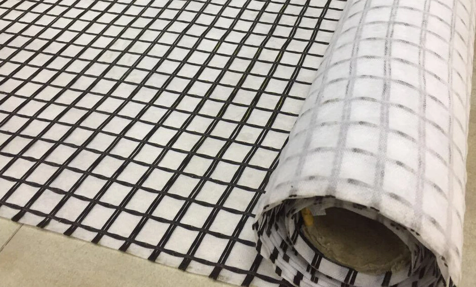 สารประกอบ Bi-Axial Fiberglass Geogrid With Nonwoven Geotextile สําหรับการเสริมสร้างดิน/วัสดุก่อสร้างถนน 6