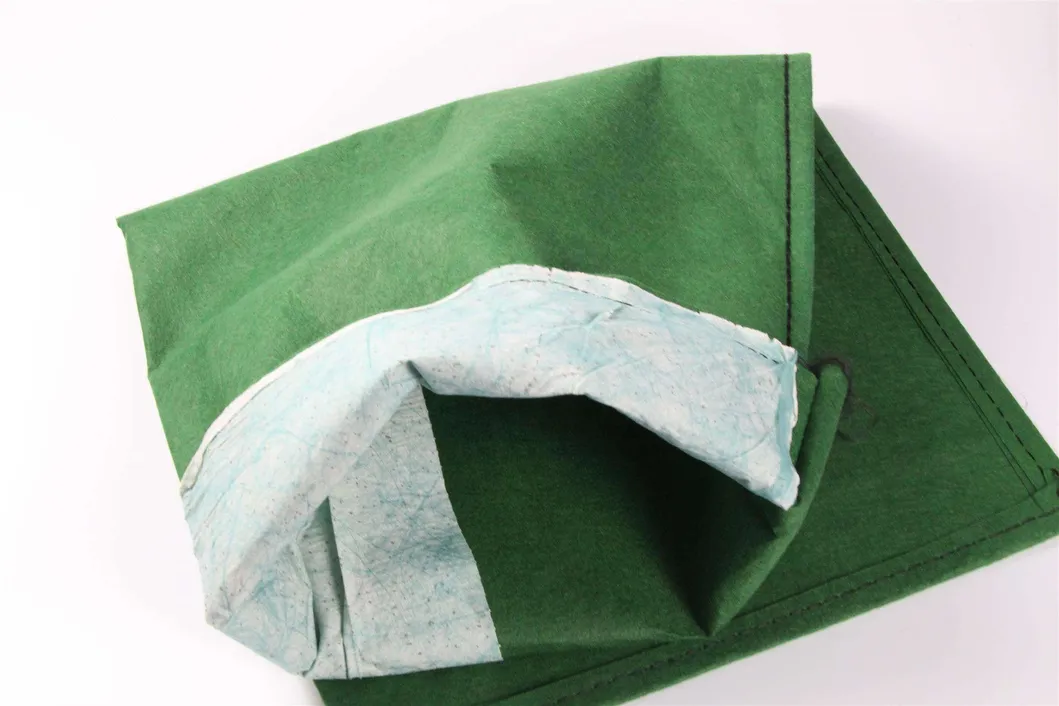 โรงงานอุตสาหกรรม 40*80cm Geotextile Geobag สําหรับการป้องกันหินทางด่วน Geotextile Geobag การปลูกป่า การปลูกหญ้า การควบคุมน้ําท่วม Geotextile Geobag 0