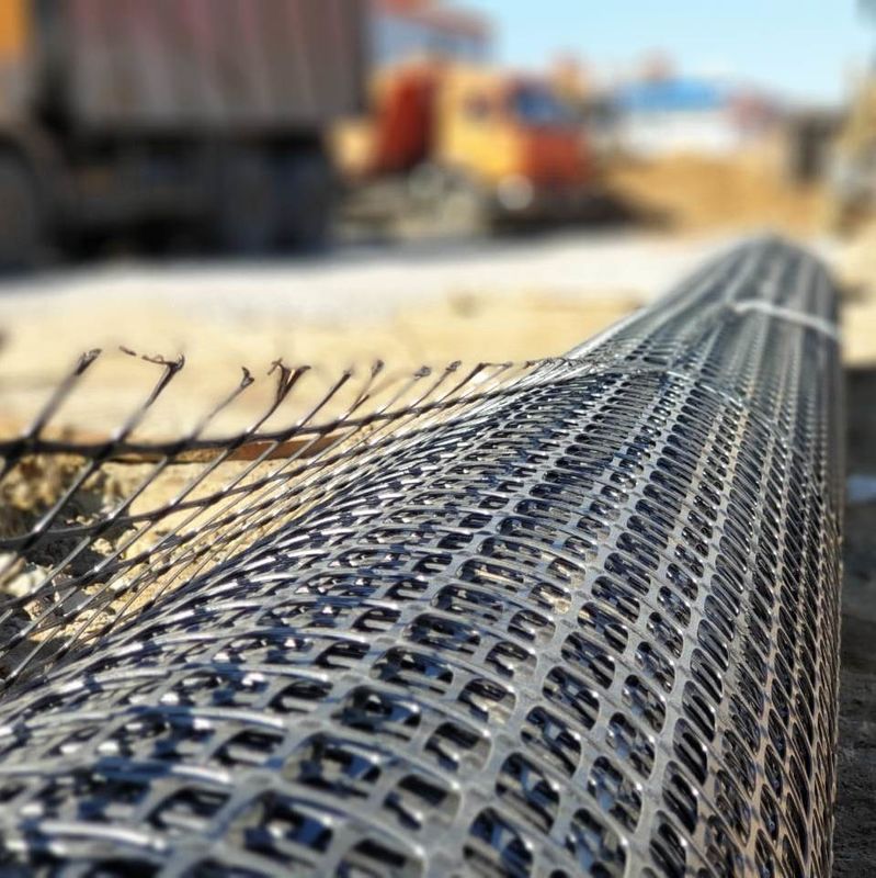 Geogrid โพลีเอสเตอร์ความแข็งแรงสูงสำหรับการเสริมแรงฐานเขื่อนและกำแพงลาดดิน
