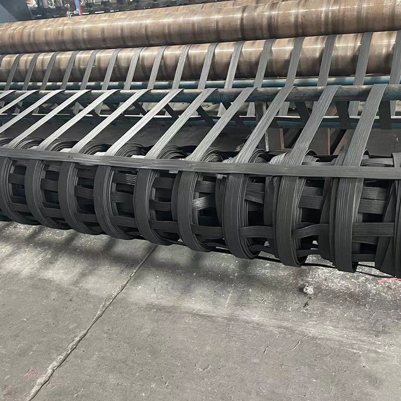 สายไฟเบอร์เสริมพลาสติก Geogrid ความแข็งแรงสูง โพลิเอสเตอร์ Bixial Geogrid สายไฟเบอร์พลาสติก Geogrid สําหรับการสร้างถนน