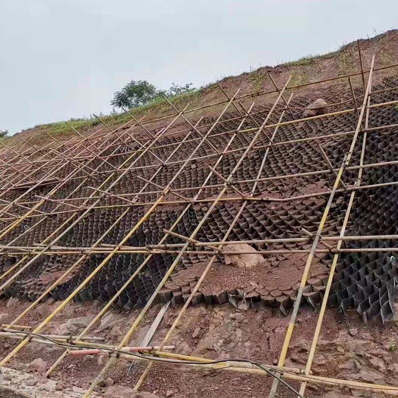 ระบบเสริมสร้างพื้นดิน โซลูเลอร์ จีโอเซลล์ ระบบกรีดศพ HDPE / PP จีโอเซลล์สําหรับถนน