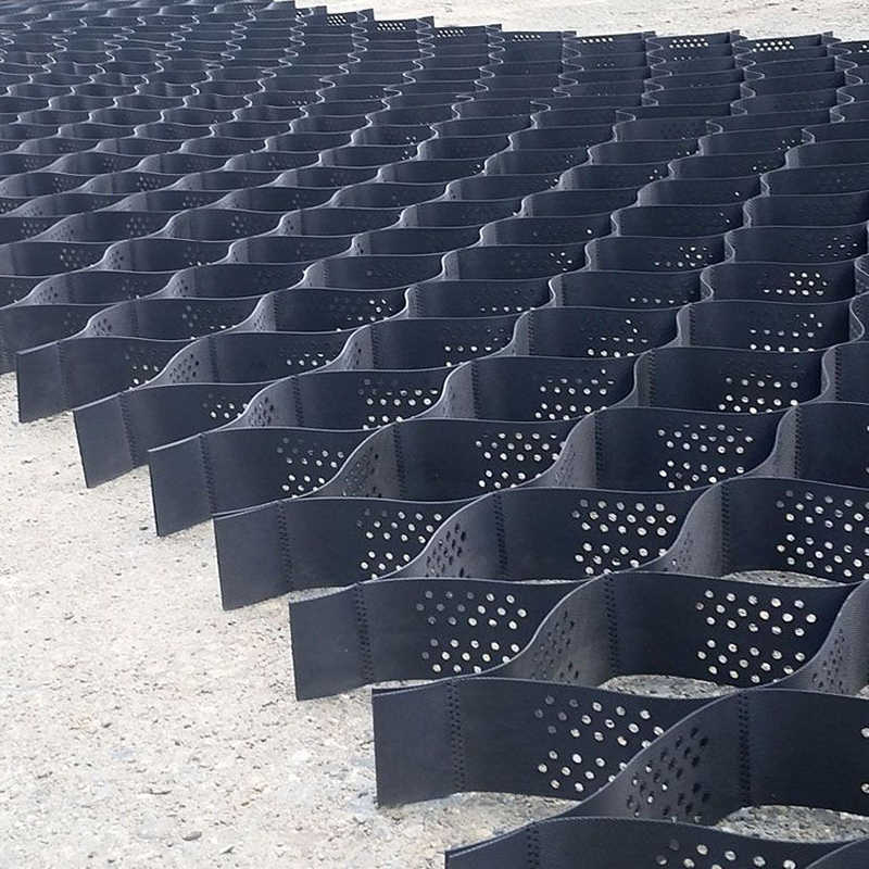 แผ่นใยสังเคราะห์ HDPE พลาสติกเจาะรูและมีพื้นผิวสำหรับเสริมความแข็งแรงของทางเข้า, เสริมฐานถนน, ลานจอดรถ และป้องกันลาด
